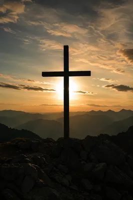 Easter Cross at Dramatic Mountain Sunrise