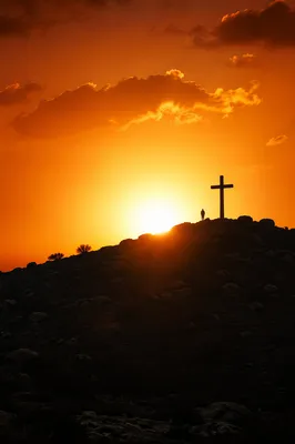 Easter Cross Silhouette at Dramatic Sunrise