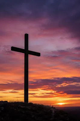 Easter Cross Silhouette at Dramatic Sunrise