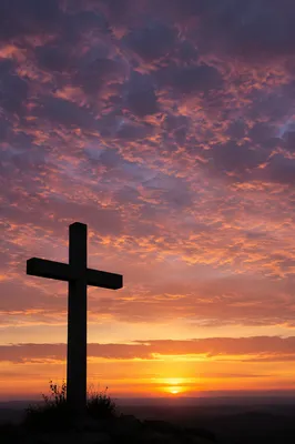 Easter Cross Silhouette at Dramatic Sunrise