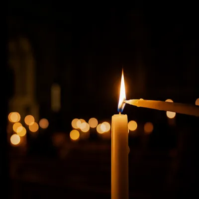 Easter Vigil Candle Flame in Dark Church