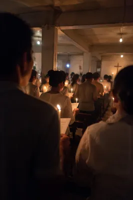 Easter Vigil Candlelight in Dark Church