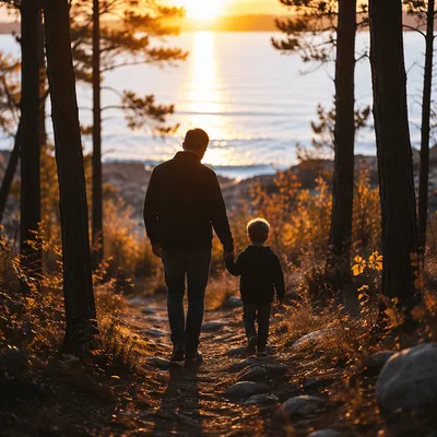 Father and Child on Sunset Woodland Path