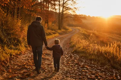Father and Child on Autumn Sunset Path