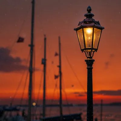 Peaceful Snowfall by Waterfront Streetlight