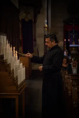 Candle Extinguishing in Dim Church Interior