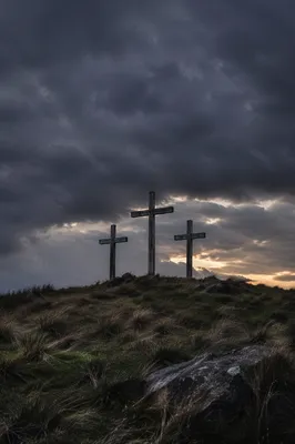 Three Crosses Beneath a Stormy Good Friday Sky