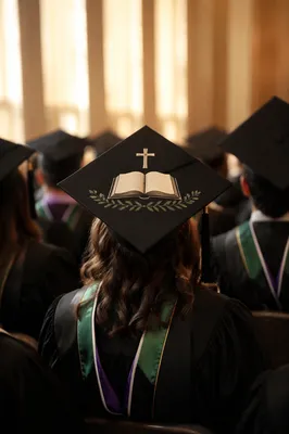 Faith Inspired Graduation Ceremony with Bible Cap