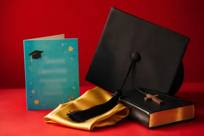 Christian Graduation Cap with Bible and Cross