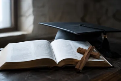 Graduation Cap Bible and Wooden Cross