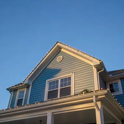 Christmas Lights Along Suburban Rooftop Gable