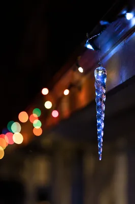 Blue Icicle Ornament on Christmas Rooftop