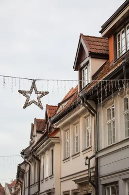 Christmas Lights Hanging on Rooftop Street
