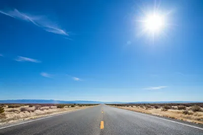 Hot Summer Sun Over Empty Road