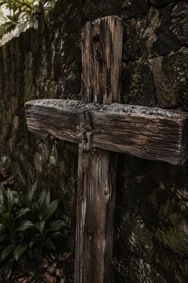Lent Ashes on Weathered Wooden Cross