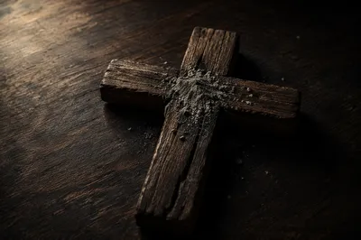Lenten Ashes on Weathered Wooden Cross