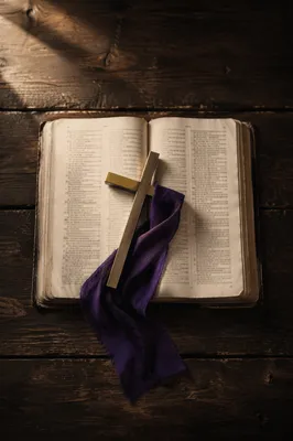 Open Devotional Book with Brass Cross