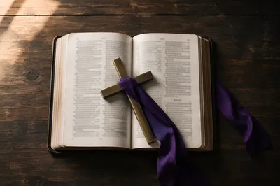 Open Devotional Book with Brass Cross