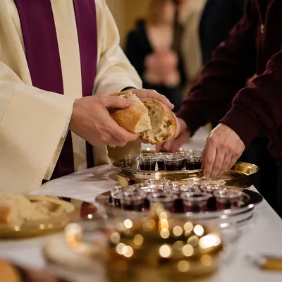 Maundy Thursday Communion Bread Breaking Closeup