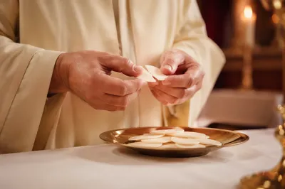 Maundy Thursday Communion Bread Breaking Close-Up