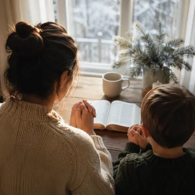 Mother and Child Praying in Winter Light