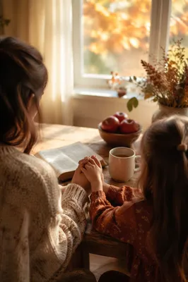 Mother and Child Praying in Autumn Light