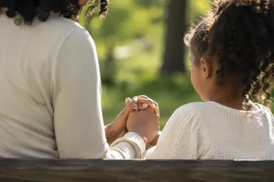 Mother and Child Prayer in Soft Morning Light