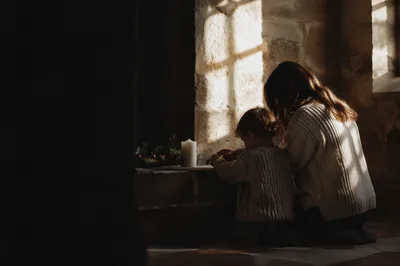 Mother and Child in Seasonal Chapel Prayer