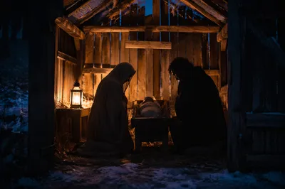 Warm Lantern Nativity in Rustic Stable