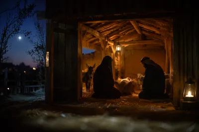Warm Lantern Nativity in Wooden Stable