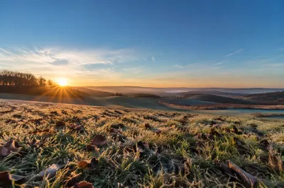 New Year Sunrise Over Frosted Winter Field