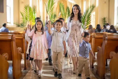 Children Waving Palm Branches in Church