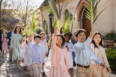 Children Waving Palm Branches Near Church