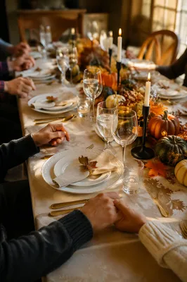 Thanksgiving Family Prayer at Autumn Dinner Table