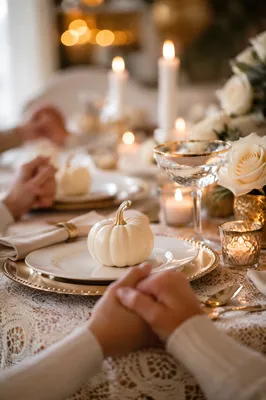Thanksgiving Family Prayer at Candlelit Dinner Table