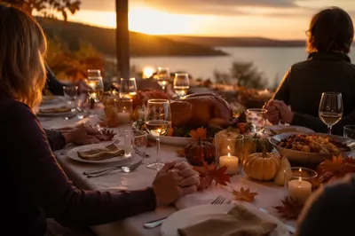 Thanksgiving Family Prayer at Sunset Table