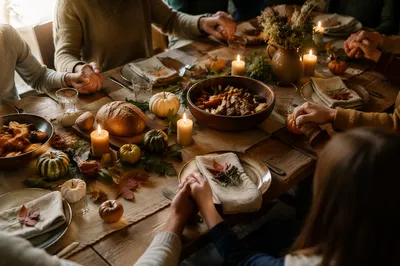 Thanksgiving Family Prayer Around Rustic Dinner Table
