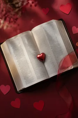 Open Bible with Red Heart Candy