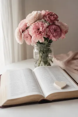 Open Bible with Pink Flowers