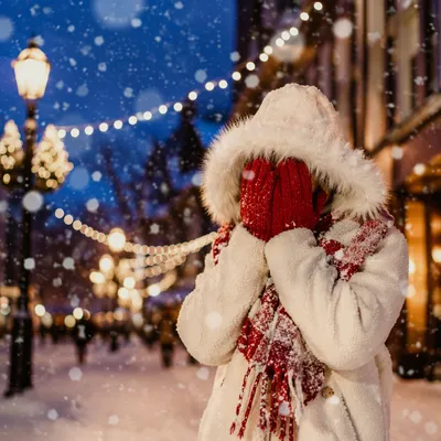 Cozy Winter Evening Under Festive Street Lamps