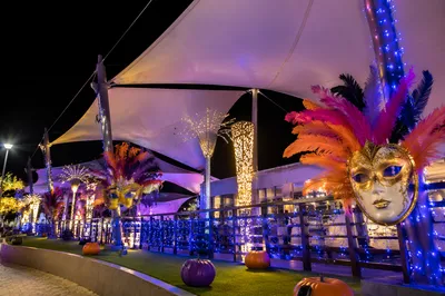 Festive Carnival Masks Under Night Canopies