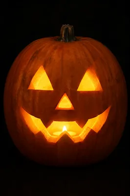 Glowing Jack O Lantern in Darkness