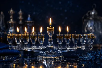 Glowing Hanukkah Menorah in Blue Gold Light