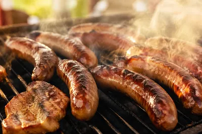 Sunset Barbecue Sausages in Golden Smoke