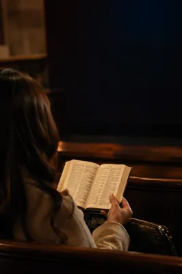 Bible Reading Challenge in Church Pew