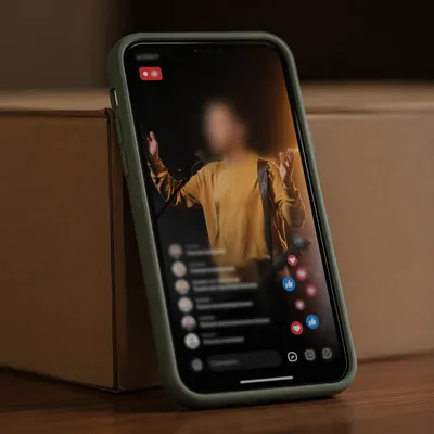 Smartphone Showing Blurred Live Stream Interface