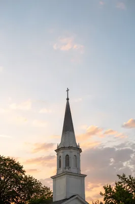 White Church Steeple Against Morning Sky