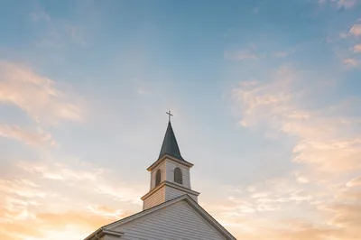 White Church Steeple Against Morning Sky