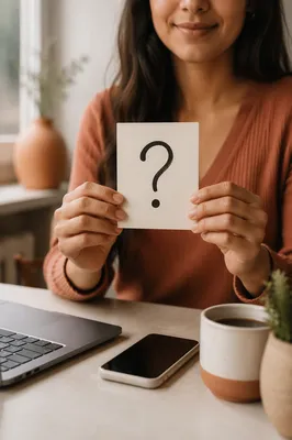 Hands Holding Question Mark Card
