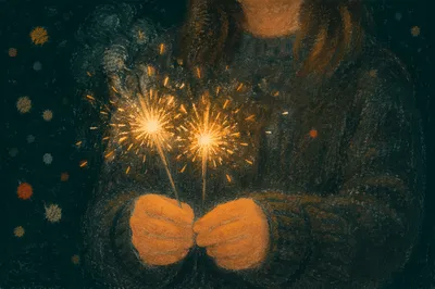 Hands Holding Sparklers at Night Celebration